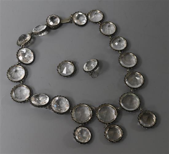 A mid to late 19th century white metal and rock crystal drop necklace and pair of matching earrings, 40cm.